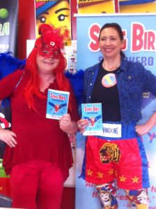Song Bird Superhero meets Captain Cybersafe at the launch.